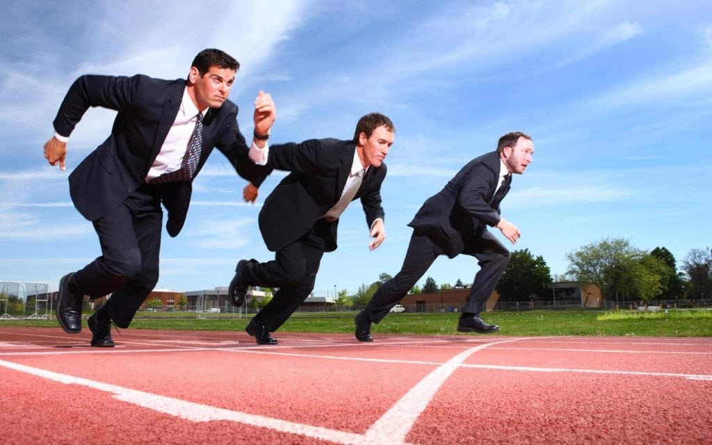 a picture of executives racing each other on a track symbolizing Epicor ERP winning as the Best Small Business ERP