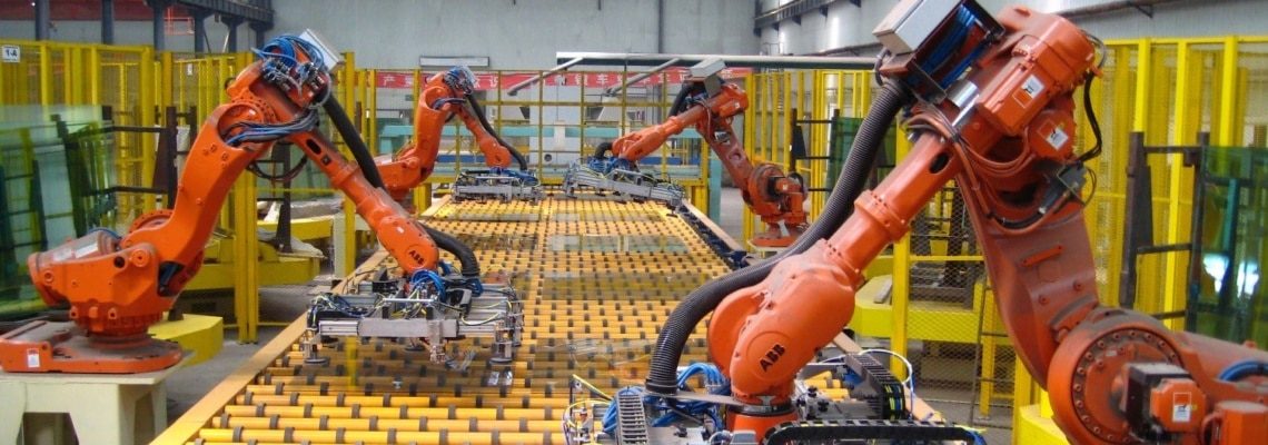 an image of fixed (hard) automation in manufacturing on the manufacturing factory floor